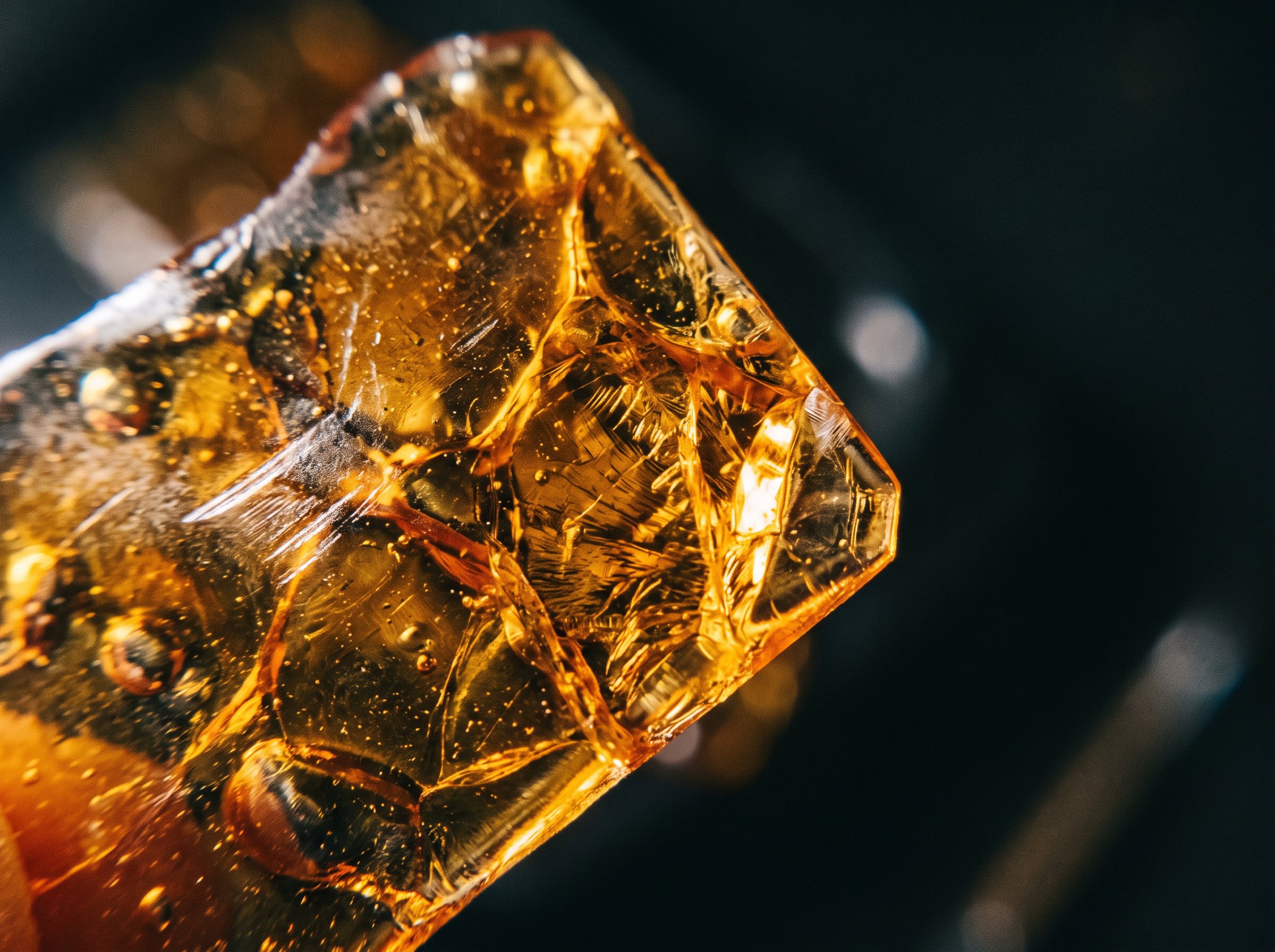 Cannabis concentrate being heated on a dab rig for dabbing guide